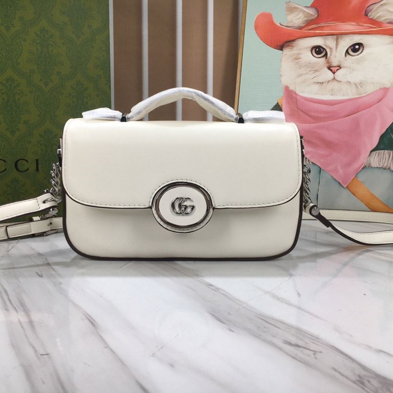 G*u*i satchel bags